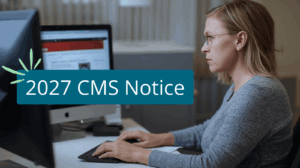 Office manager reading about the cms adance notice for 2027